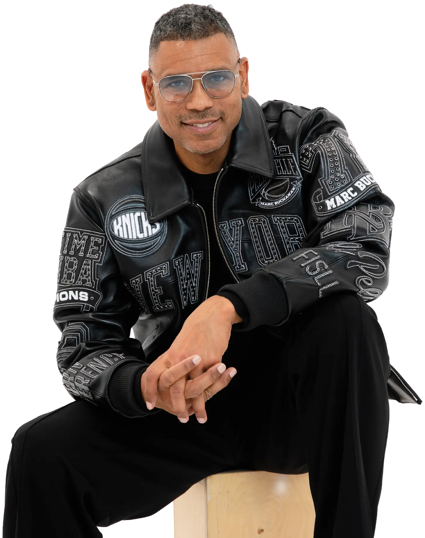 Allan Houston seated in black jacket