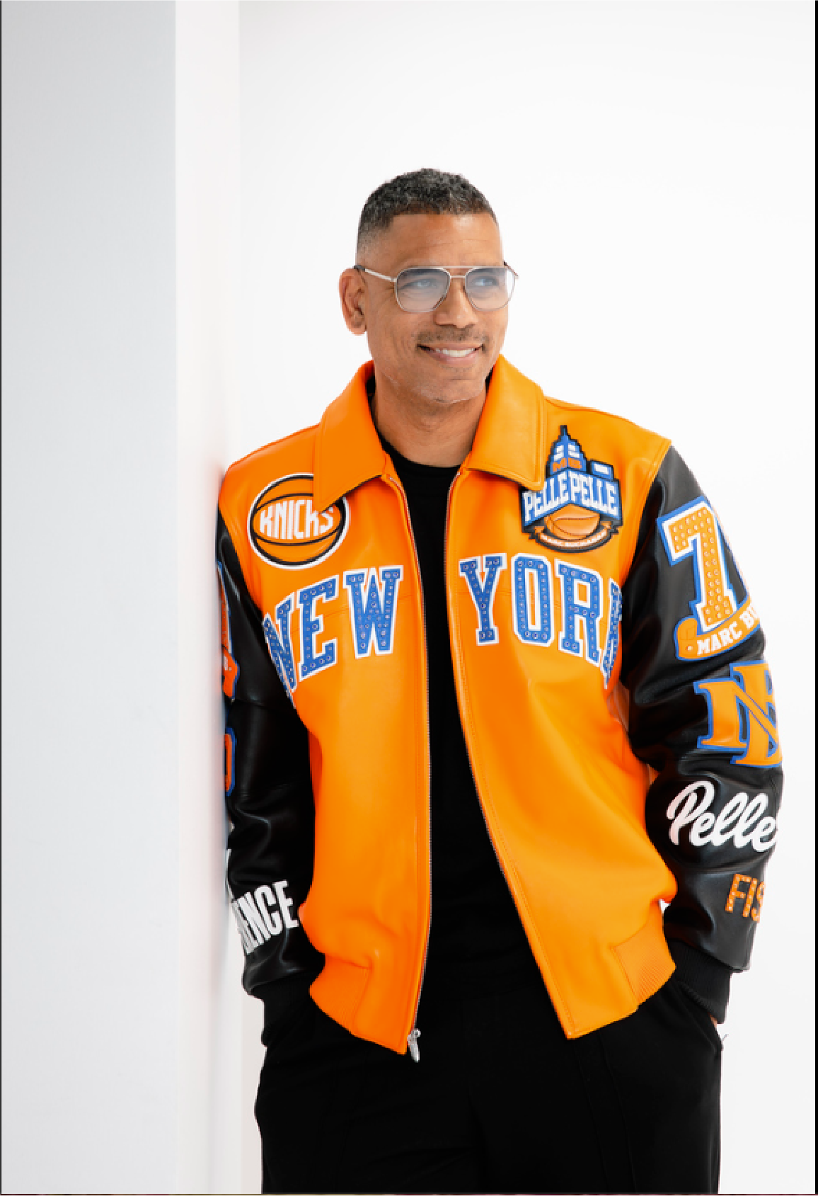 Allan Houston in orange New York jacket